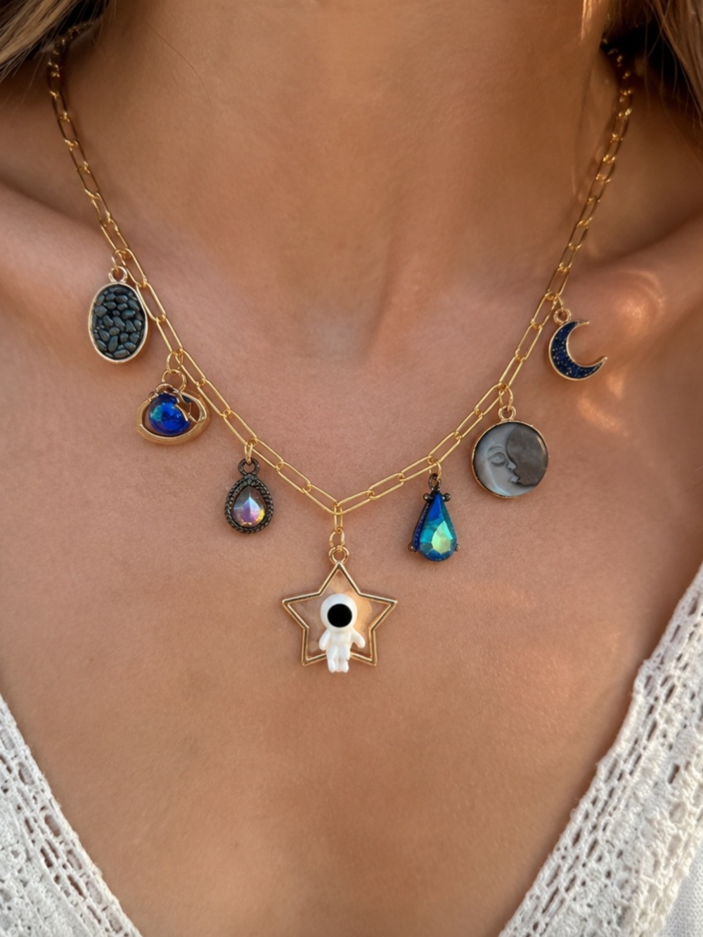 Gold-Tone Multi Charm Necklace with Blue and Iridescent Accents
